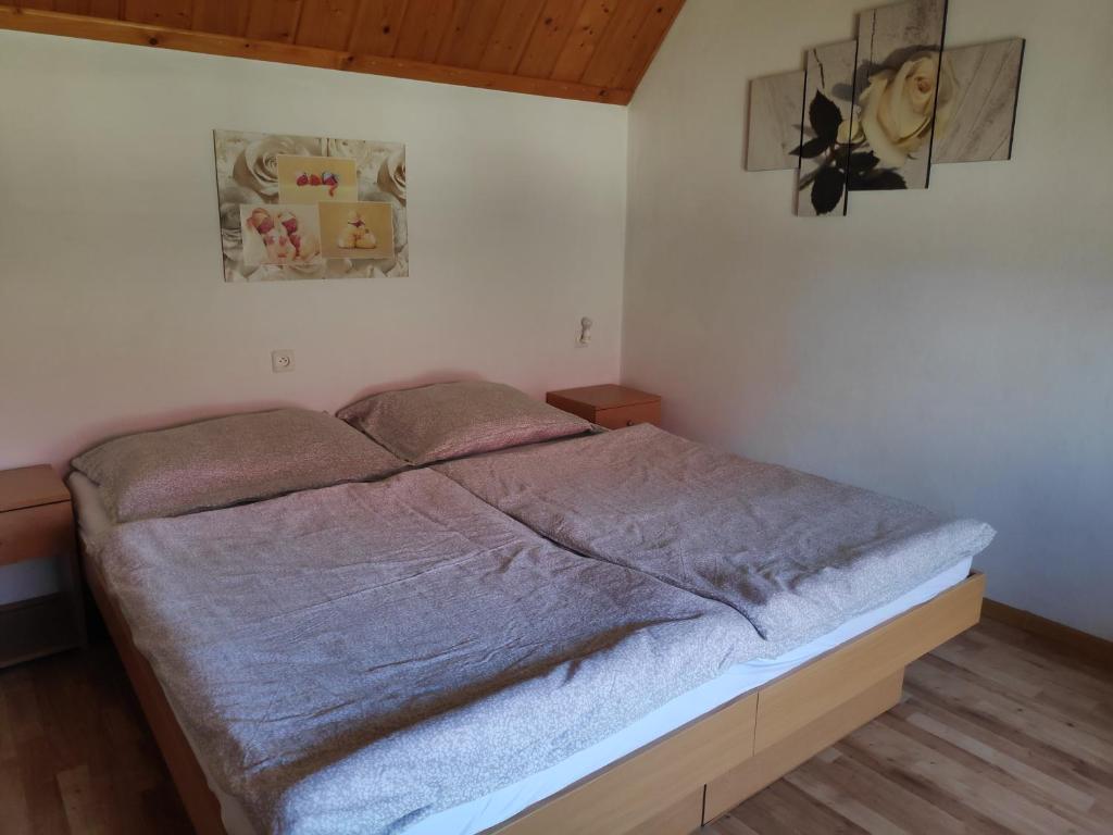 Postel nebo postele na pokoji v ubytování Domček Janina
