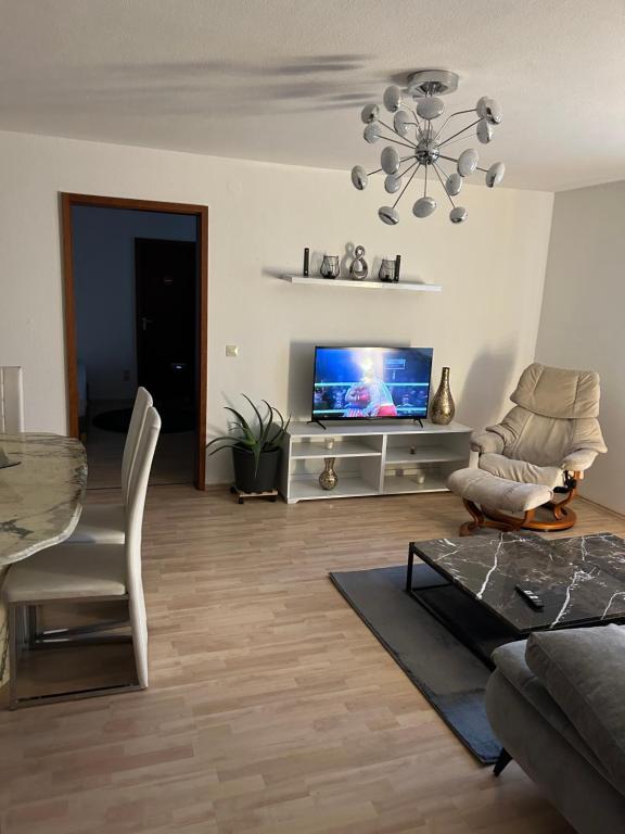 TV a/nebo společenská místnost v ubytování Ferienwohnung Schwarzwald