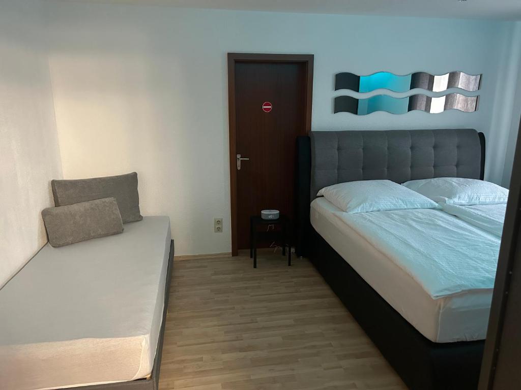 Postel nebo postele na pokoji v ubytování Ferienwohnung Schwarzwald