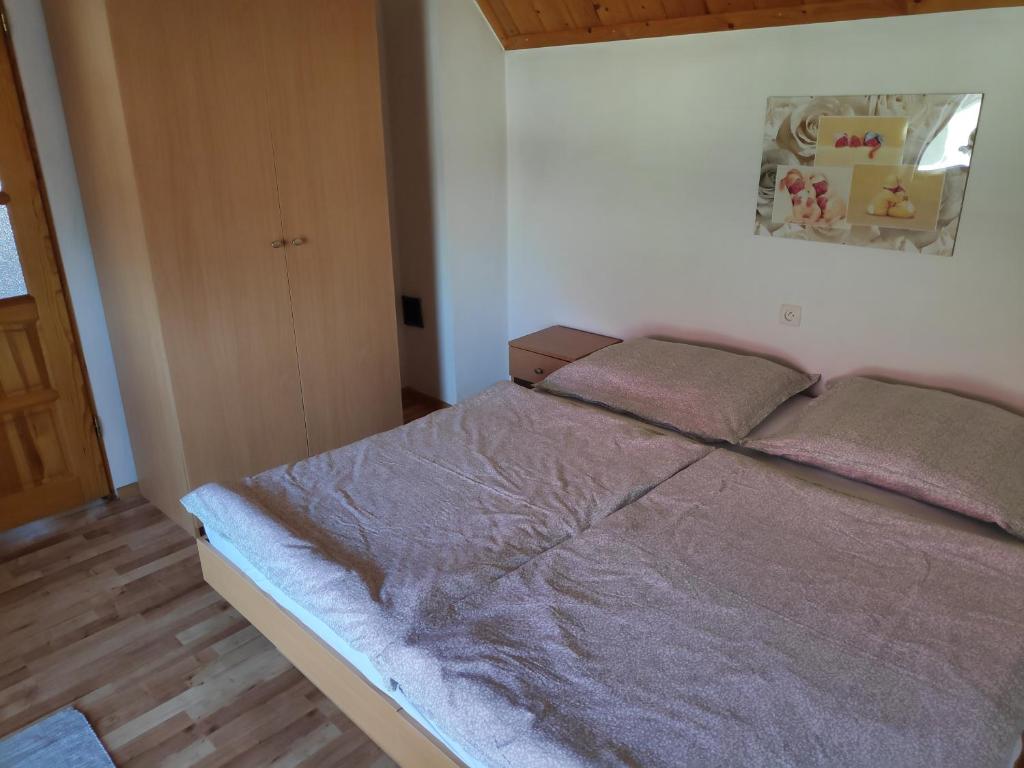 Postel nebo postele na pokoji v ubytování Domček Janina