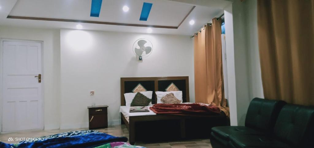 Postel nebo postele na pokoji v ubytování Hotel Saspolo skardu