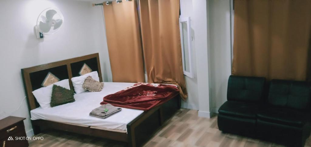 Postel nebo postele na pokoji v ubytování Hotel Saspolo skardu