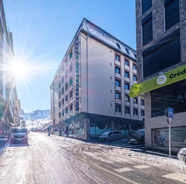 an empty street in a city with buildings at Hotel Sporting in Pas de la Casa