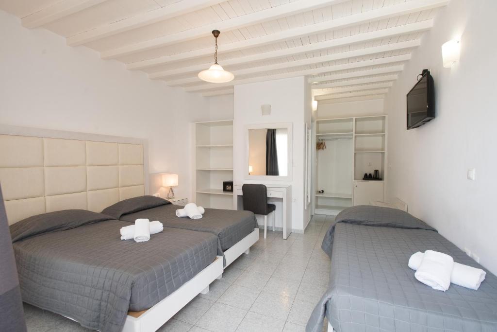 Postel nebo postele na pokoji v ubytování Domna Hotel
