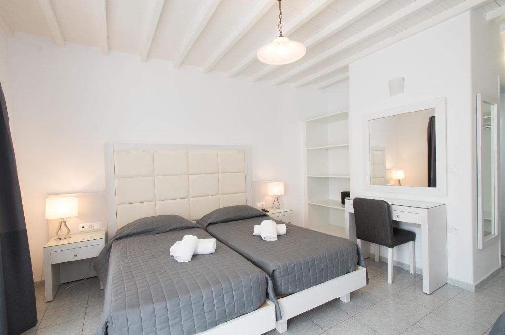 Postel nebo postele na pokoji v ubytování Domna Hotel
