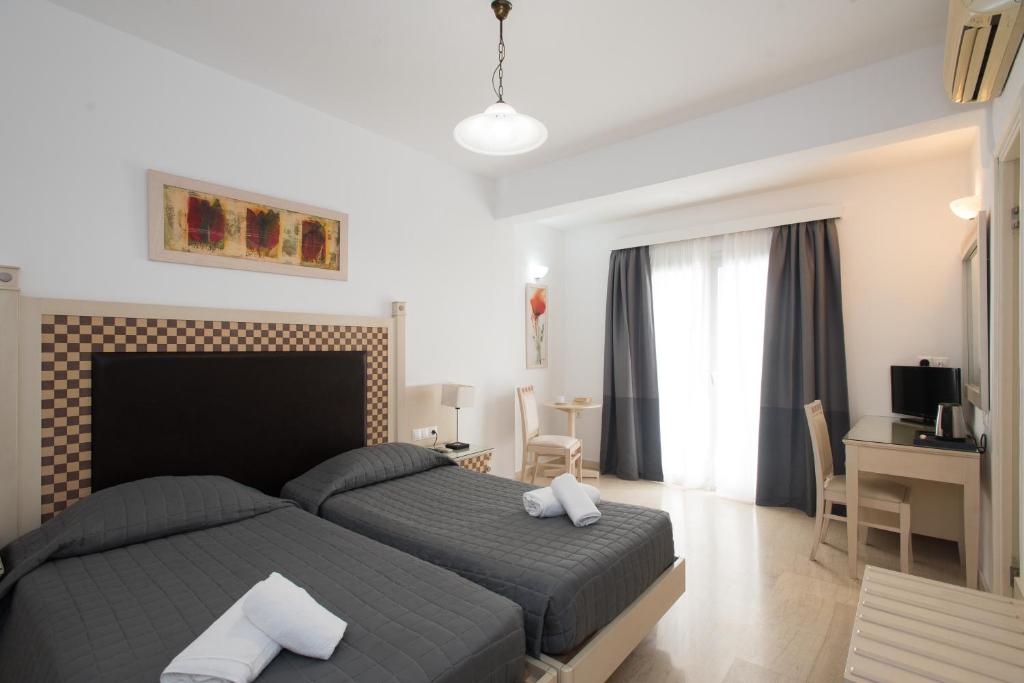 Postel nebo postele na pokoji v ubytování Domna Hotel