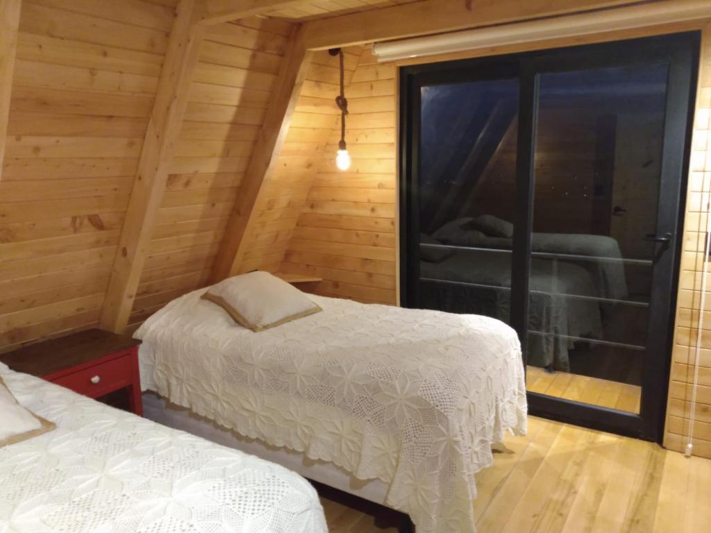 Postel nebo postele na pokoji v ubytování Hacienda El Rejo