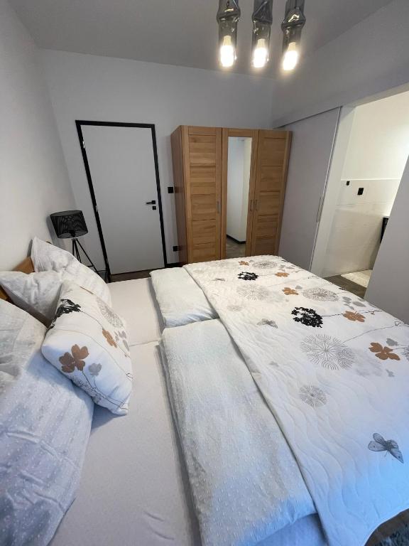 Postel nebo postele na pokoji v ubytování Chalet Sijkovsky