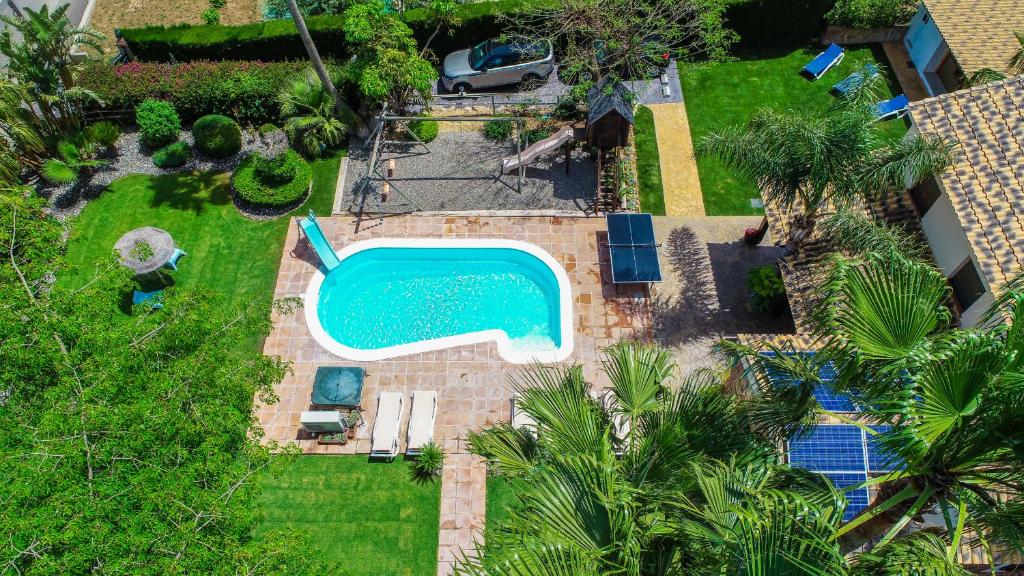 The swimming pool at or close to Cubo's Villa Llanos de la Plata