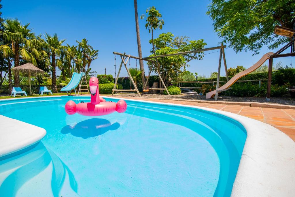 The swimming pool at or close to Cubo's Villa Llanos de la Plata