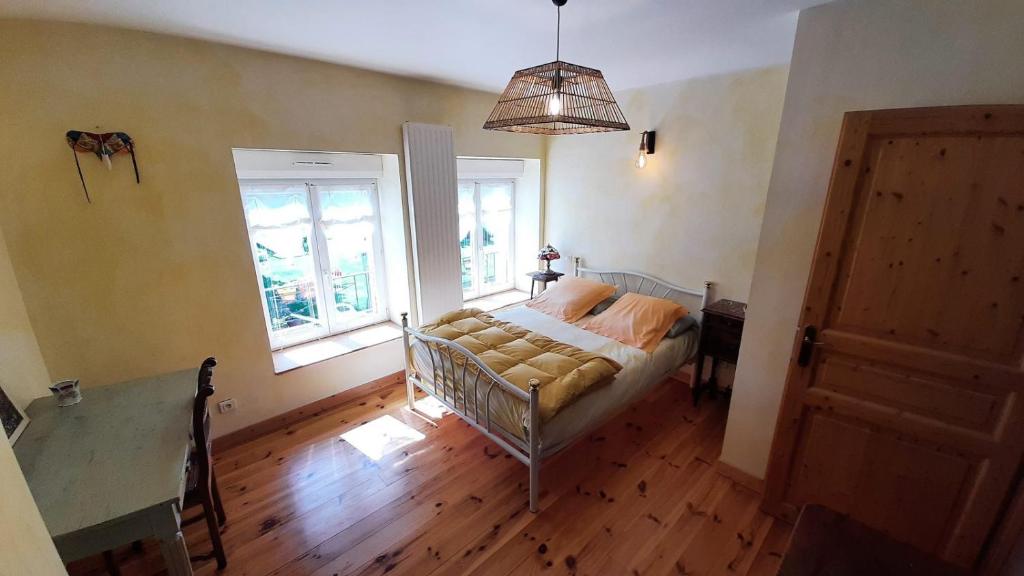 Posteľ alebo postele v izbe v ubytovaní Chez Patou - Chambres d'hôtes