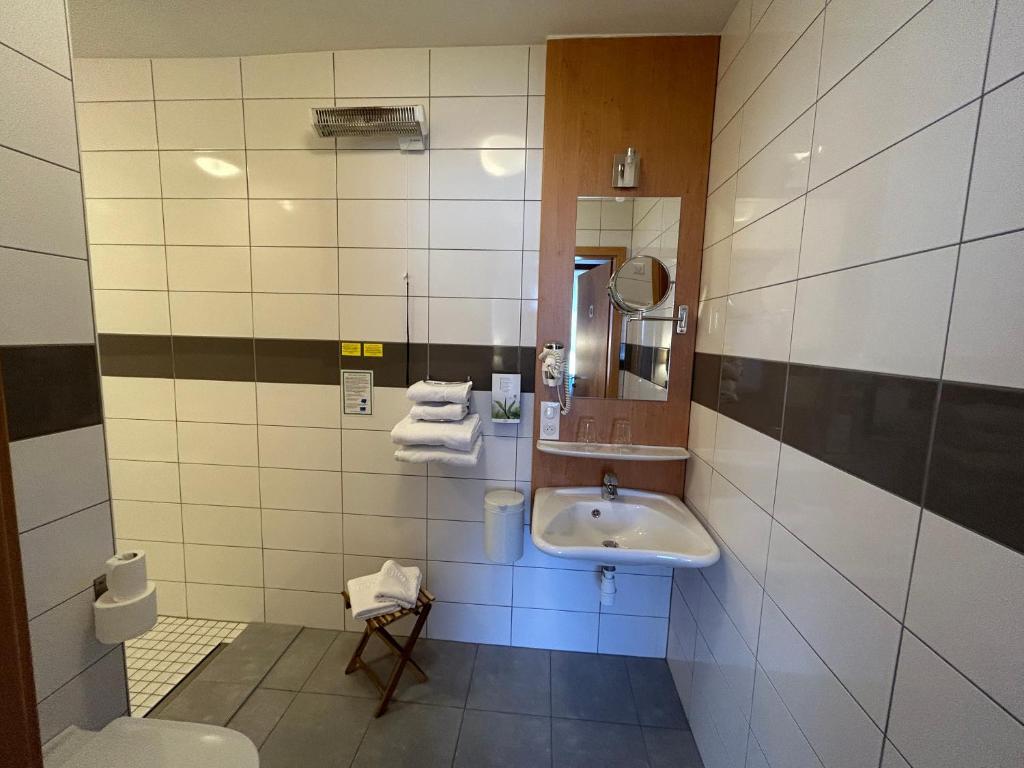 Koupelna v ubytování Auberge Des Mésanges