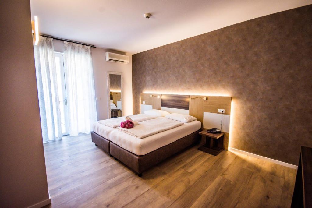 Postel nebo postele na pokoji v ubytování Hotel Eden