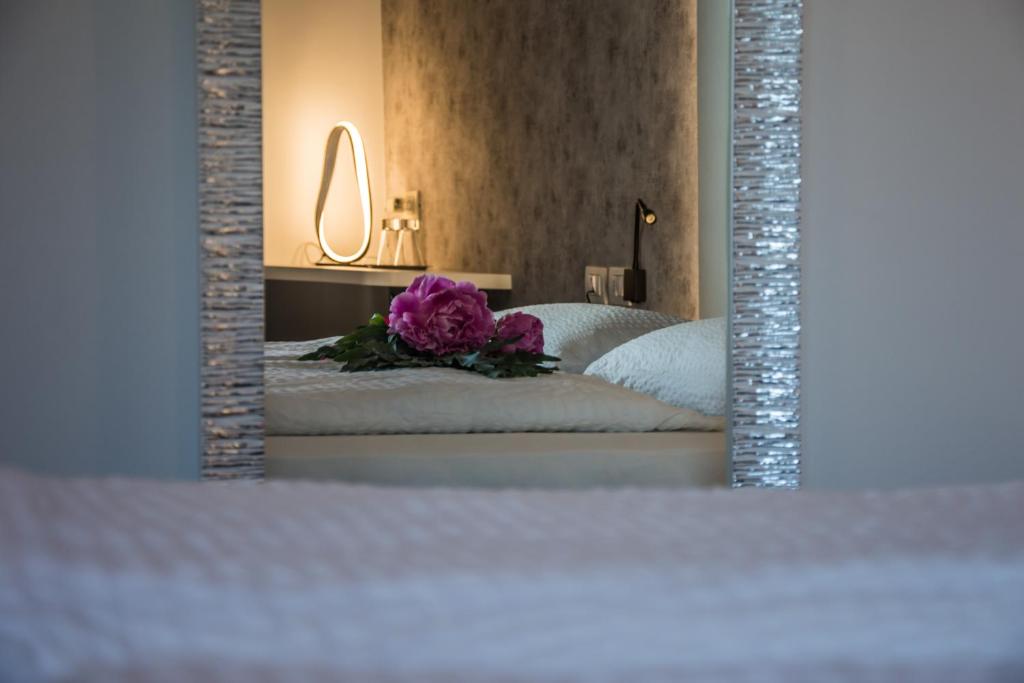 Postel nebo postele na pokoji v ubytování Hotel Eden