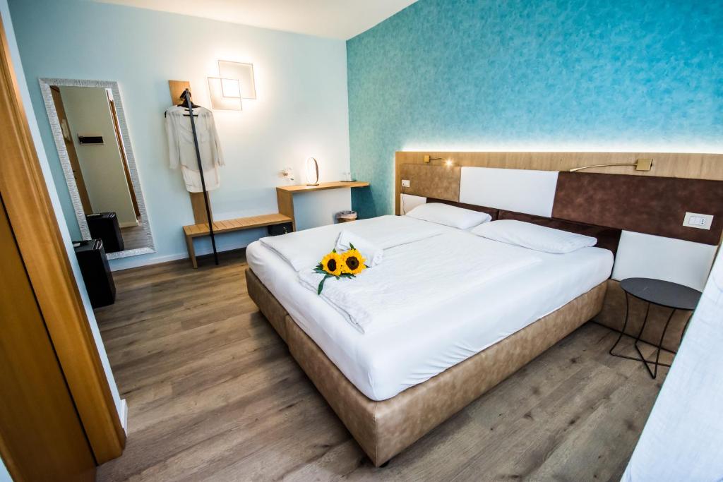 Postel nebo postele na pokoji v ubytování Hotel Eden