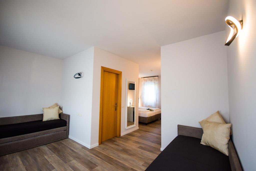 Postel nebo postele na pokoji v ubytování Hotel Eden