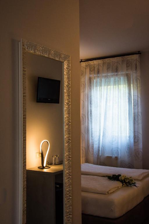TV a/nebo společenská místnost v ubytování Hotel Eden