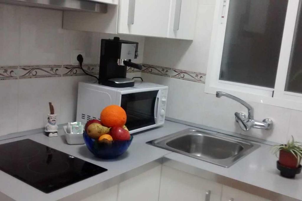 A kitchen or kitchenette at Apartamento La flor de Mayo