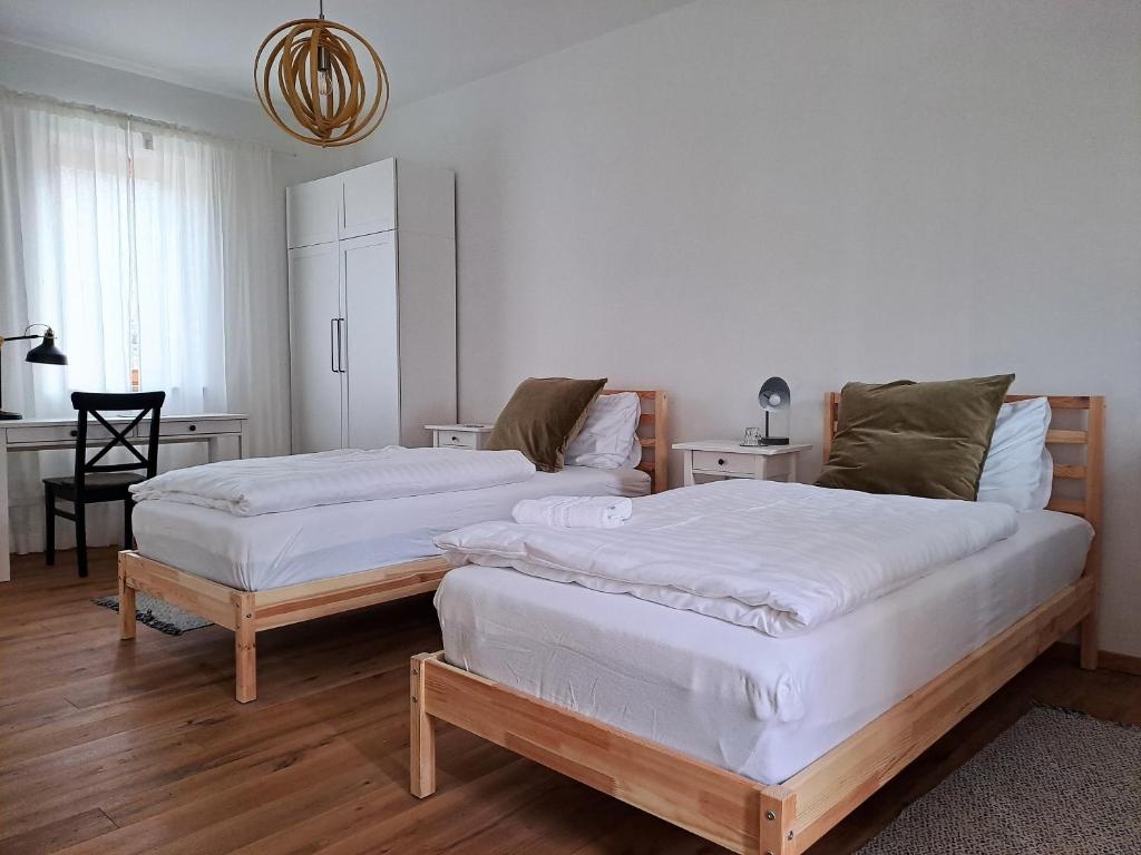 Postel nebo postele na pokoji v ubytování Quartier35