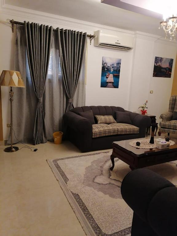 Posezení v ubytování Cozy fully furnished studio