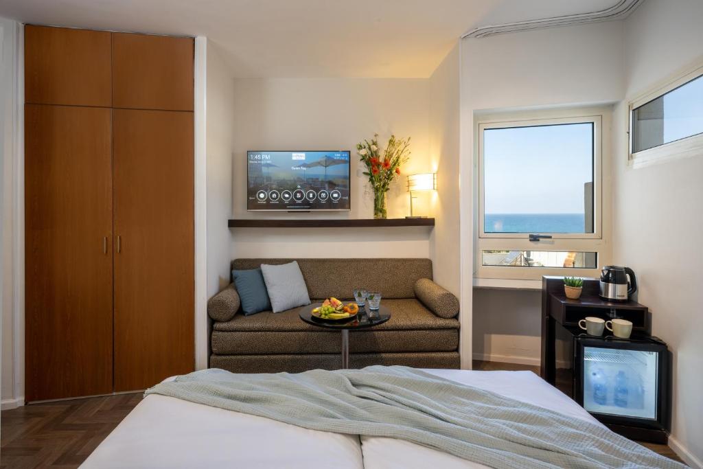 TV a/nebo společenská místnost v ubytování Maxim Design Hotel 3 Star Superior