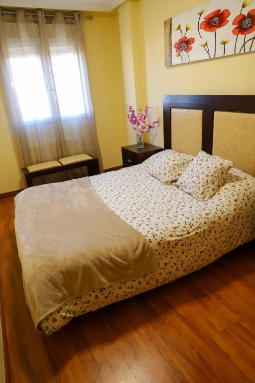 Posteľ alebo postele v izbe v ubytovaní Casa MJ