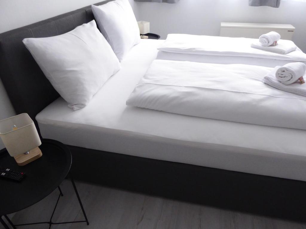 Posteľ alebo postele v izbe v ubytovaní Wohhhlfühl Appartement im Zentrum Graz