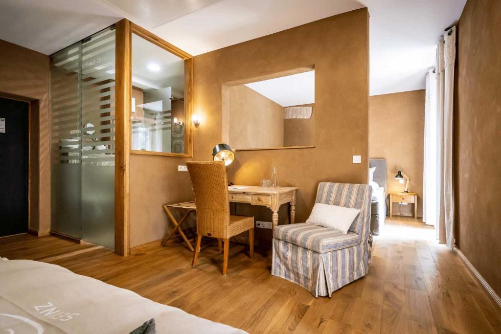 Postel nebo postele na pokoji v ubytování SEINZ Wisdom Resort - Bio-Hotel vegan-vegetarisch