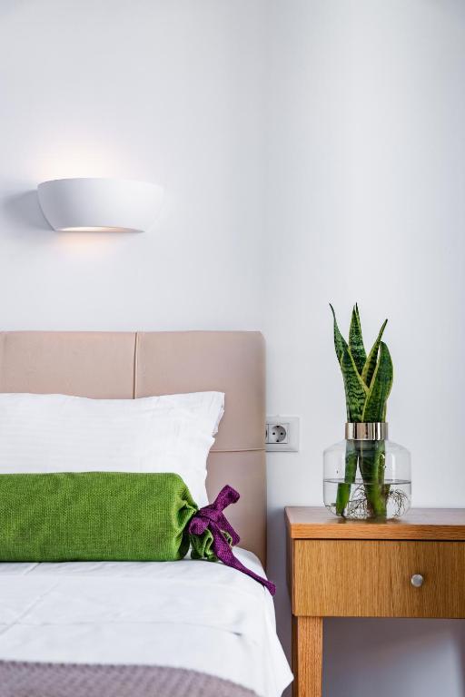 Postel nebo postele na pokoji v ubytování Malia Mare Hotel