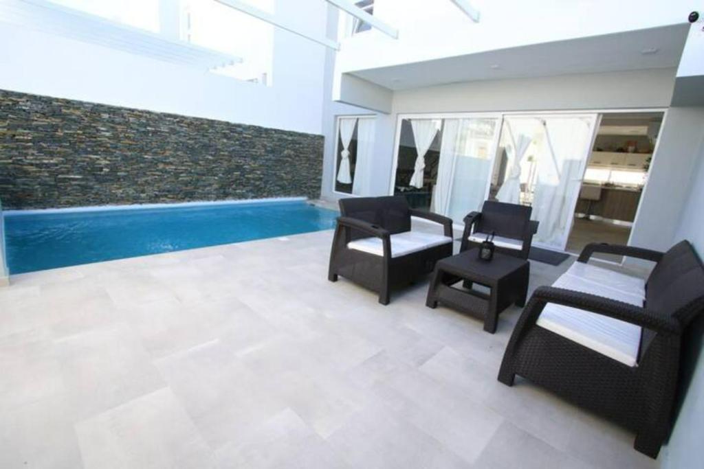 Πισίνα στο ή κοντά στο Villa Bayahibe 103