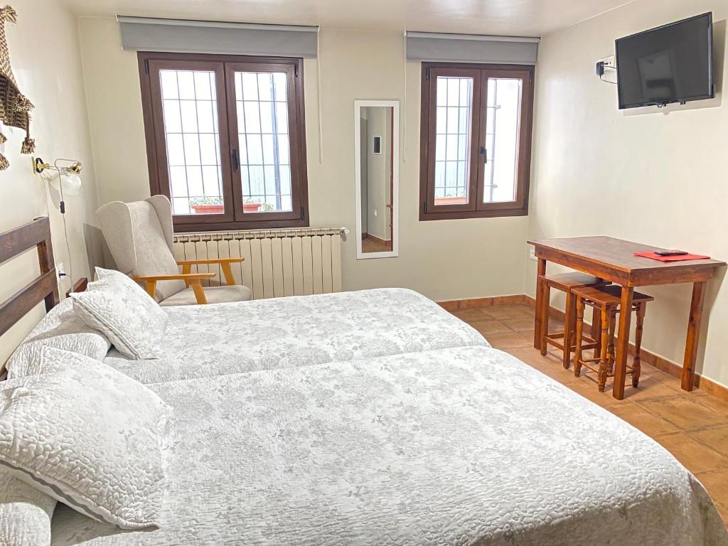 Postel nebo postele na pokoji v ubytování Casa Sara