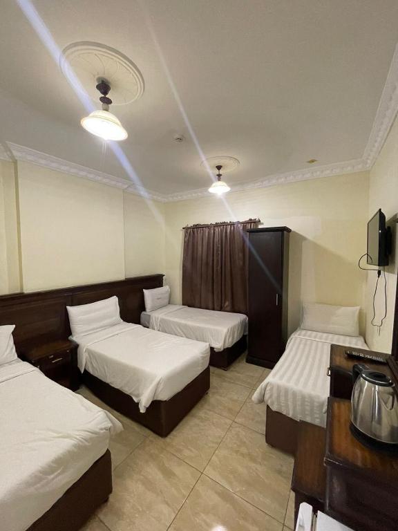 بيت التوحيد أجياد - Quadruple Room