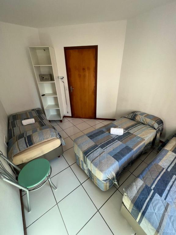 Postel nebo postele na pokoji v ubytování Pousada Louise