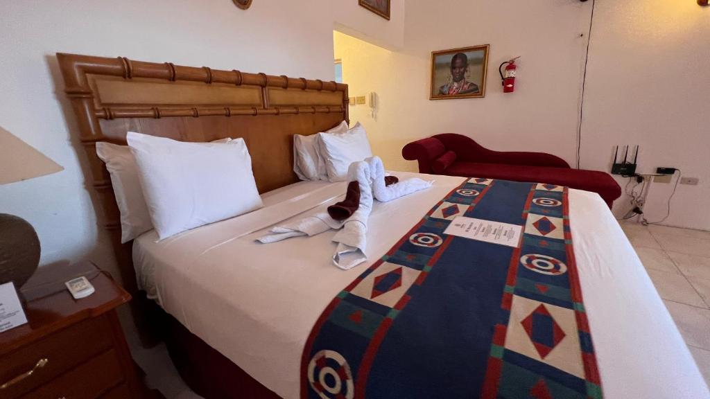 Postel nebo postele na pokoji v ubytování All Nations Guest House