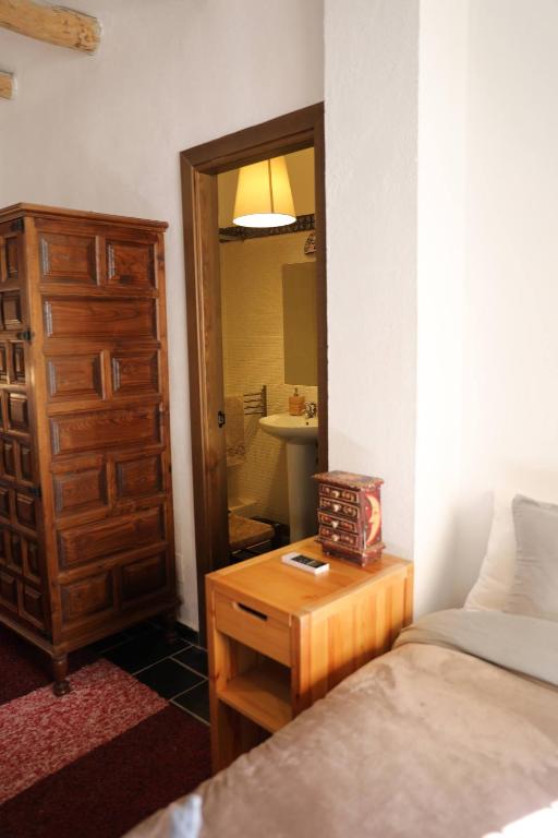 Posteľ alebo postele v izbe v ubytovaní Casa corasol, a cozy, comfy, 2BR house- panoramic view and rooftop
