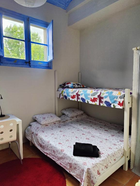 Postel nebo postele na pokoji v ubytování Cal Gat