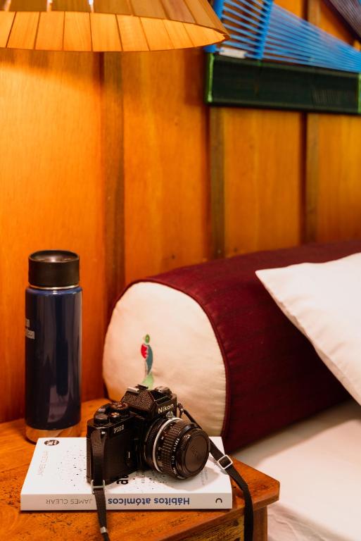 Postel nebo postele na pokoji v ubytování Trogon Lodge