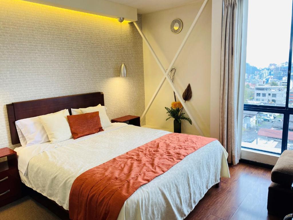 Postel nebo postele na pokoji v ubytování Suites Metropoli
