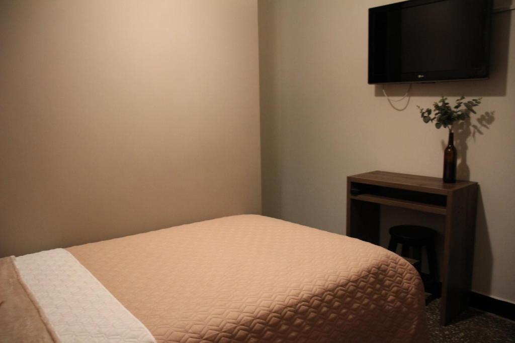 TV a/nebo společenská místnost v ubytování Hotel Plaza El Santuario