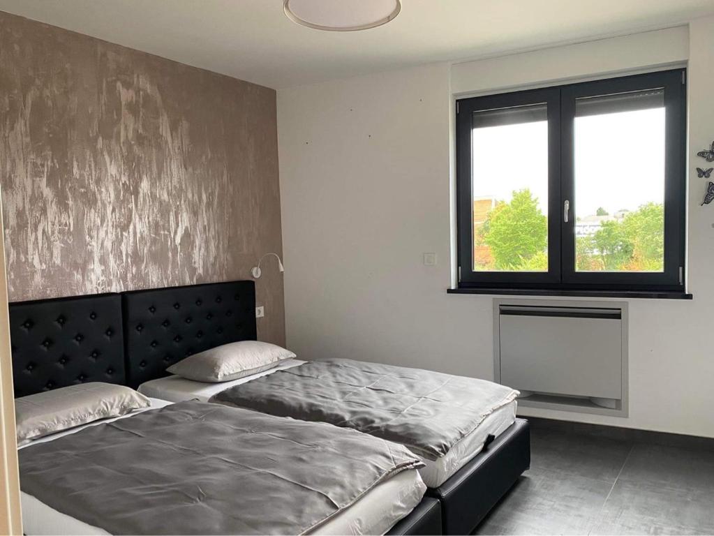 Posteľ alebo postele v izbe v ubytovaní Seaview