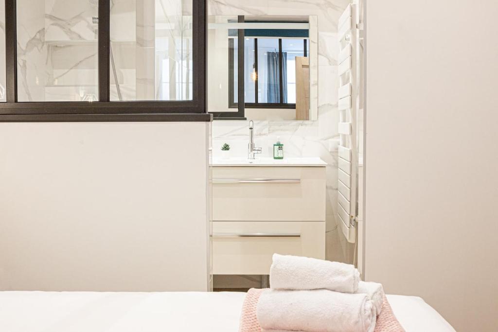 Posteľ alebo postele v izbe v ubytovaní White diamond calme rue Vaugelas
