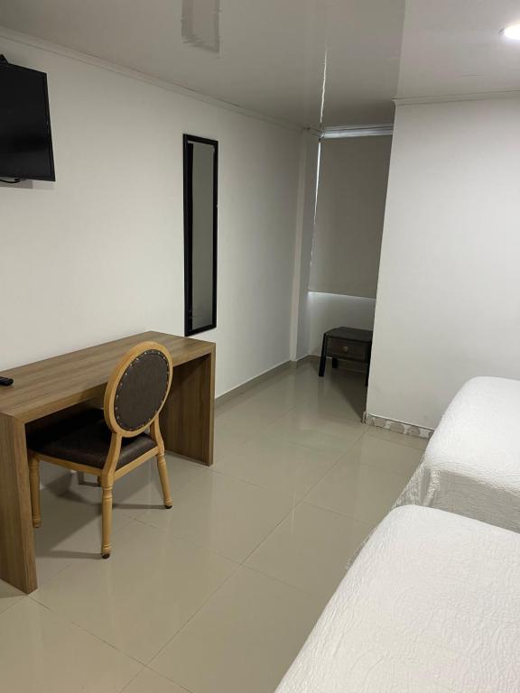 Postel nebo postele na pokoji v ubytování Apartahotel Marbella