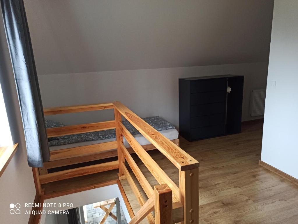Posteľ alebo postele v izbe v ubytovaní Apartameny Wiktoria i Nikola w Karwiku