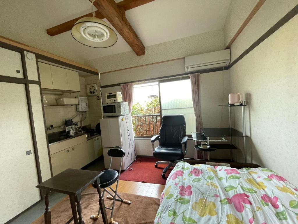 Kuchyň nebo kuchyňský kout v ubytování Kyoto Wakouan Retro Stay