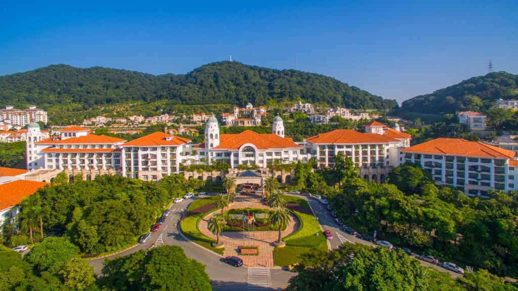 an aerial view of a city with trees and buildings at Guangzhou Phoenix City Hotel in Zengcheng