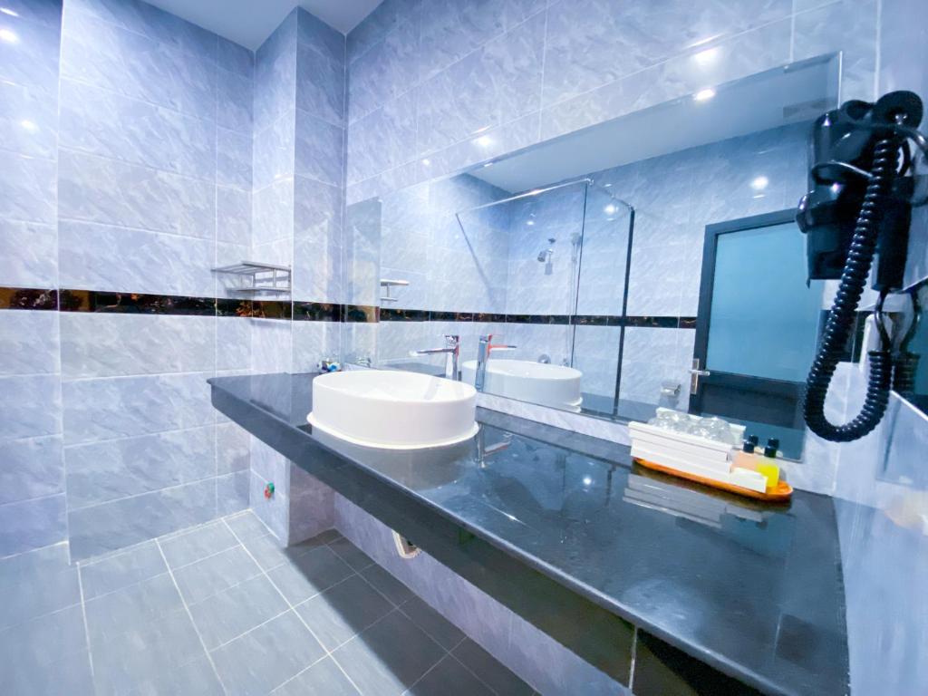 Koupelna v ubytování Sopheak Mongkol Guesthouse