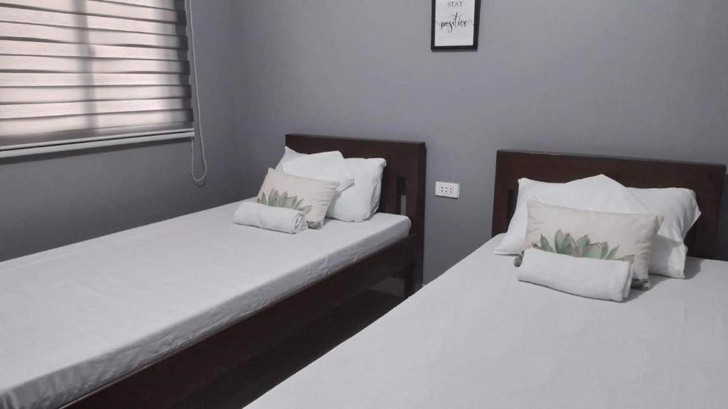 Postel nebo postele na pokoji v ubytování The Tent Sipalay