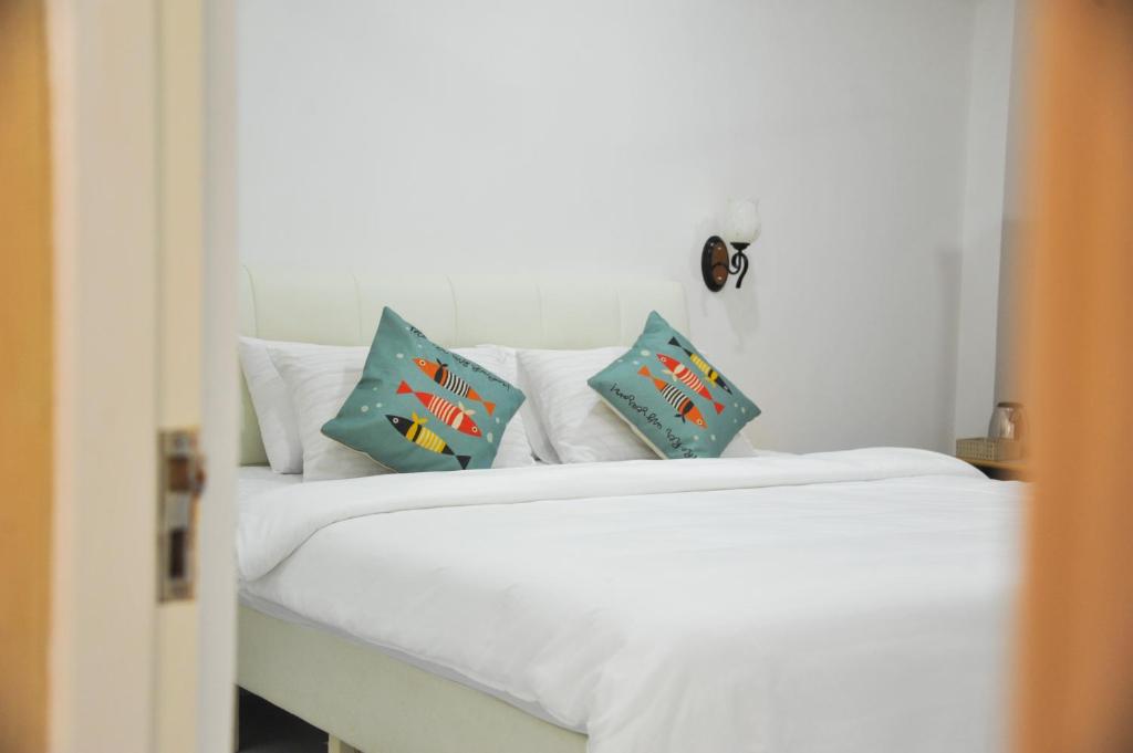 Postel nebo postele na pokoji v ubytování Asseyri Guest House