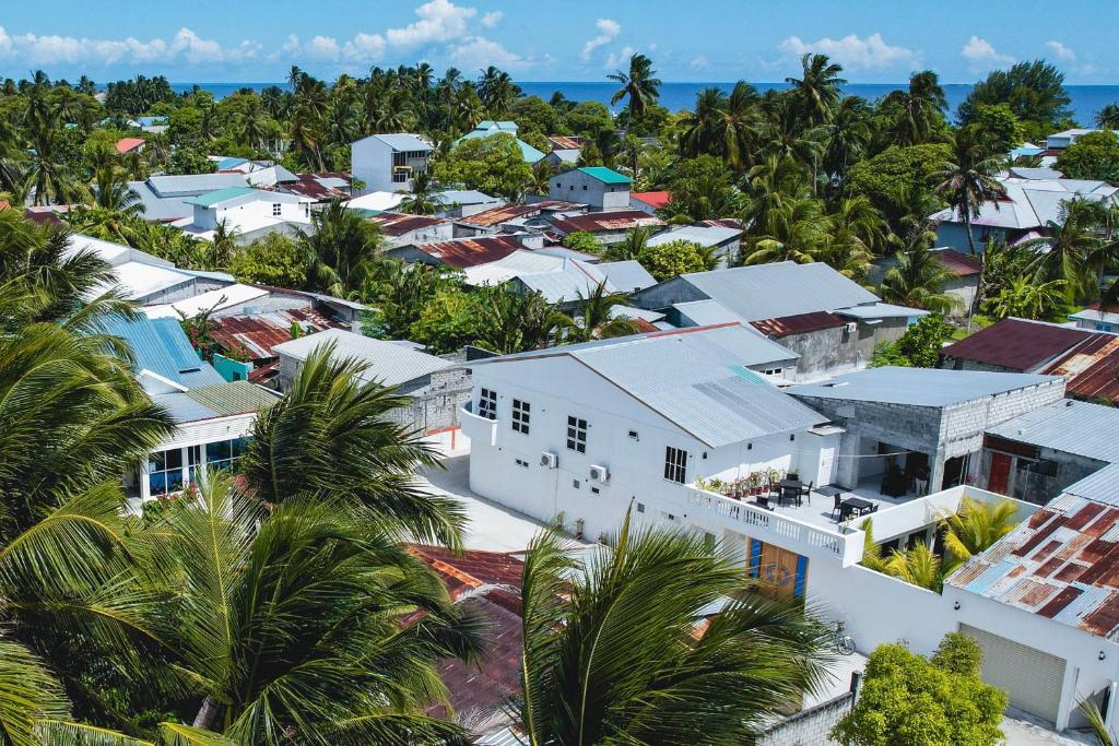 an aerial view of a city with houses at Asseyri Guest House in Maradhoofeydhoo