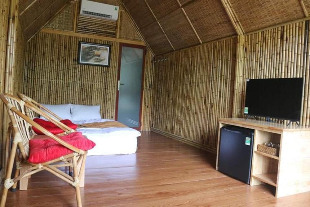 TV a/nebo společenská místnost v ubytování Coco Island Cồn Phụng
